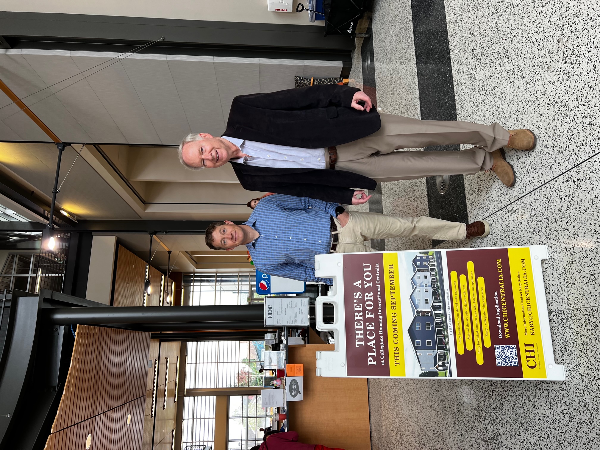 Owners with CHI ad at Centralia College